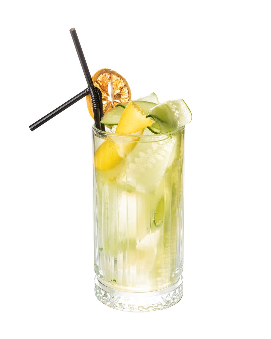 Cucumber and citrus cocktail on white background, drink photography Singapore