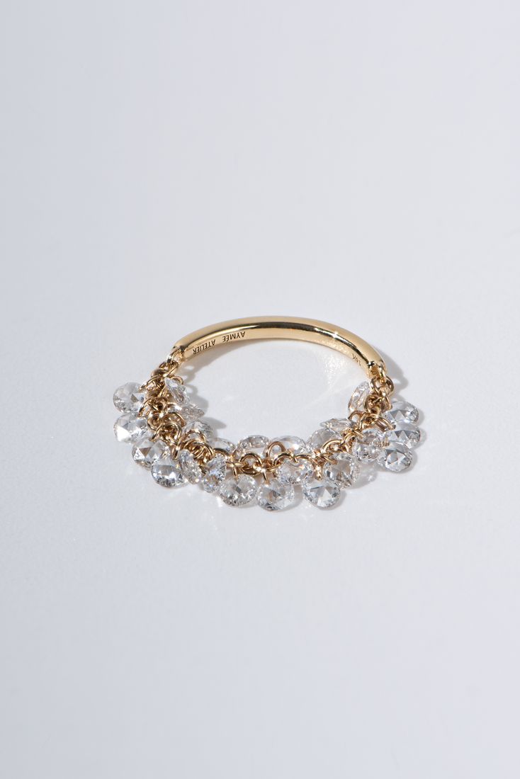 Gold band with floating diamonds, jewellery catalogue photography